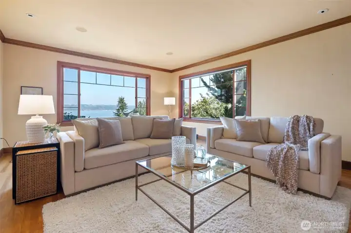 The big picture windows in the living room show off a view you’ll never get tired of. The big picture windows in the living room show off a view you’ll never get tired of.