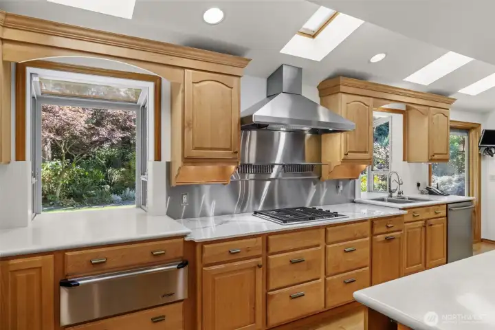 Gourmet Kitchen with Custom Cabinetry, Marble & Quartz Counters