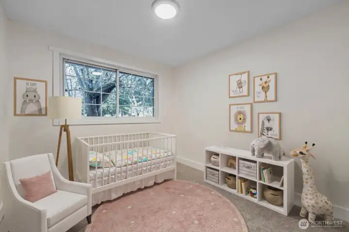 Virtually staged. 3rd bedroom with brand new carpet, large closet, fresh paint and all new lighting.