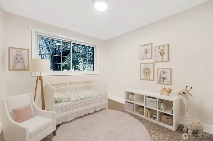 Virtually staged. 3rd bedroom with brand new carpet, large closet, fresh paint and all new lighting.