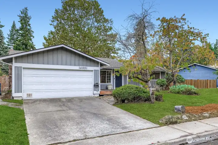 2 Car Garage with 2 car parking pad.