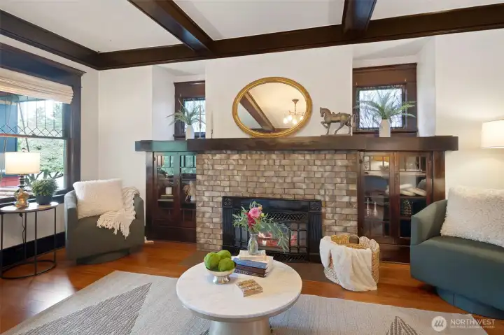 The gas fireplace is the center of attention with tile and built-ins.
