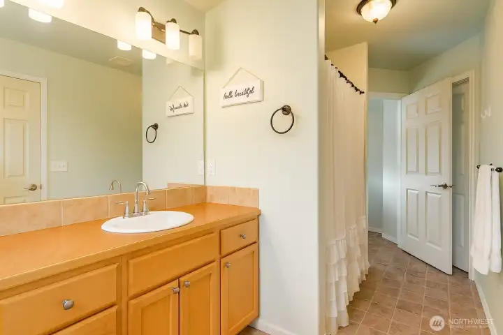 Master Bath with Shower and walk in closet virtually enhanced