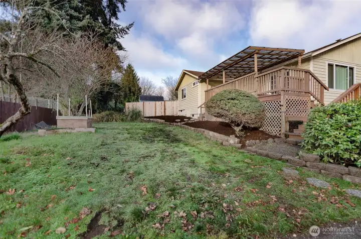 Notice the terraced beds on side yard.
