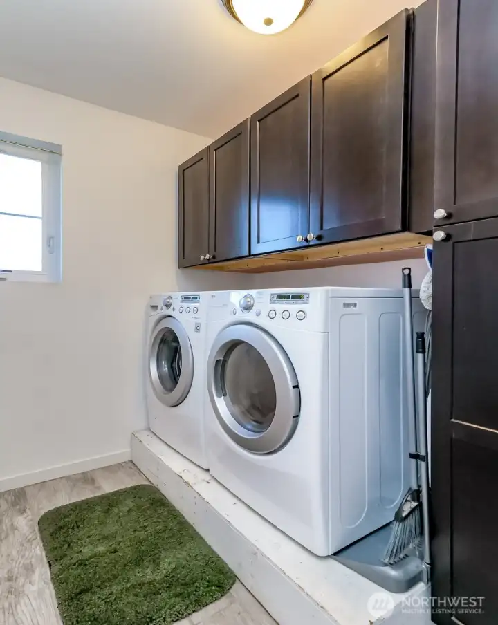 Laundry Room up stairs with plenty of cupboards