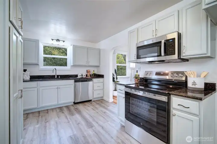 Well-appointed kitchen with generous counter space and an efficient layout for cooking