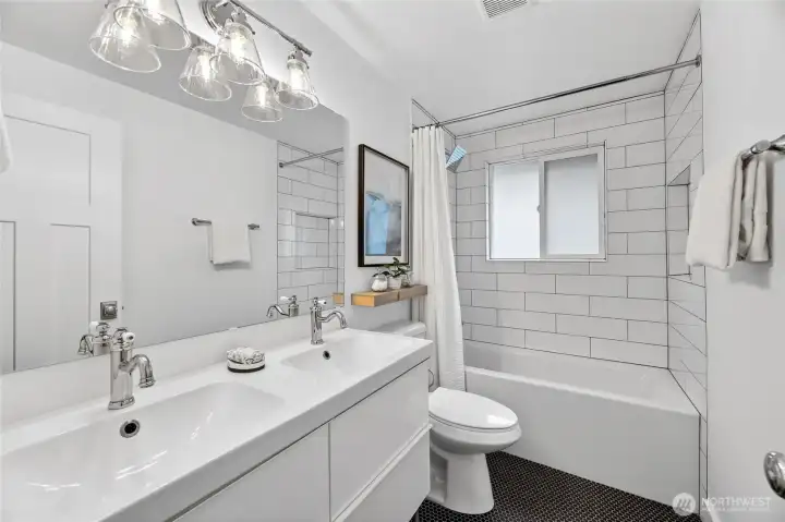 Fully remodeled main floor bathroom.