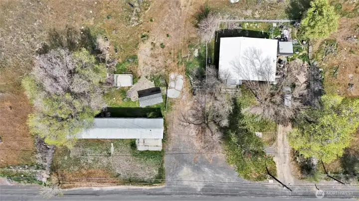 The trailer is on 2.27 acres, and the rental house is on the other parcel. (Sold Together)