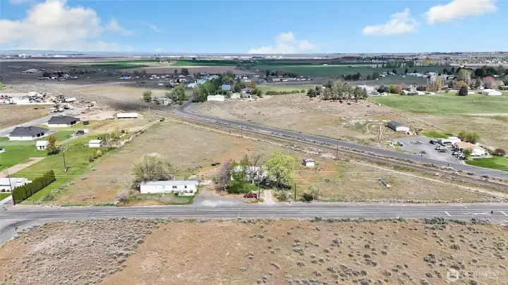 This whole triangle could be yours! Little building on the right of the house is the well and pumphouse.