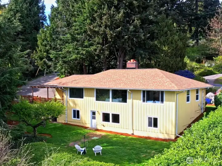 This south wall of the home abounds in windows that look out to Mount Rainier.