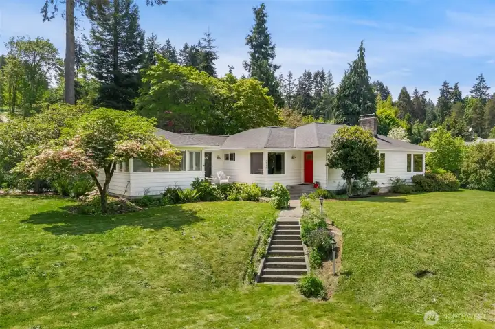 Rare single story rambler remodeled in 2016 rambler with Harbor Views on .71 acres.