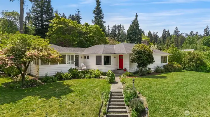 Remodeled down to the studs, but with Old Bainbridge charm and mature landscaping in one of the most prized close to town neighborhoods.  Wide .71 acre water view lot.