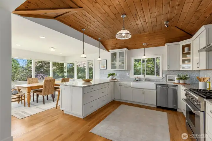 All new in 2016 plumbing, electrical, insulation, drywall, paint, roof, appliances, cabinetry, and countertops throughout Most windows replaced except for some in the picturesque dining area which were kept to maximize the water view. The Oak floors are the only original feature refinished by Port Madison Wood Floors.