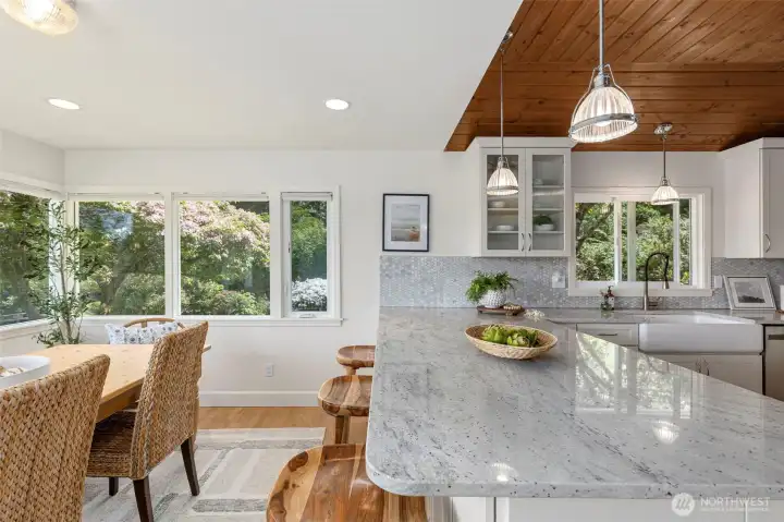 Additional seating at the large granite countertop