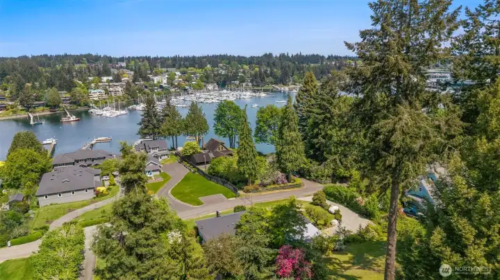 Overhead drone picture of 5930 Rose Loop (more video and pictures attached to the listing) showing the proximity to town.  Beach access is at the end of the loop.  Possible to paddle board across to the Harbor Pub.