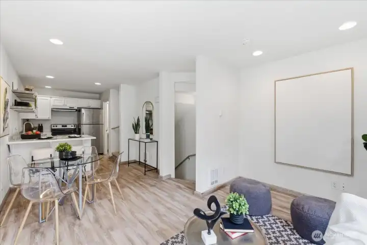 Looking from living room to kitchen with eating area