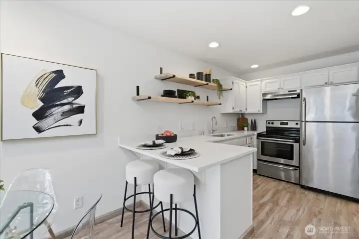 Kitchen with New Quartz Countertops, stainless Appliances and new floating shelves