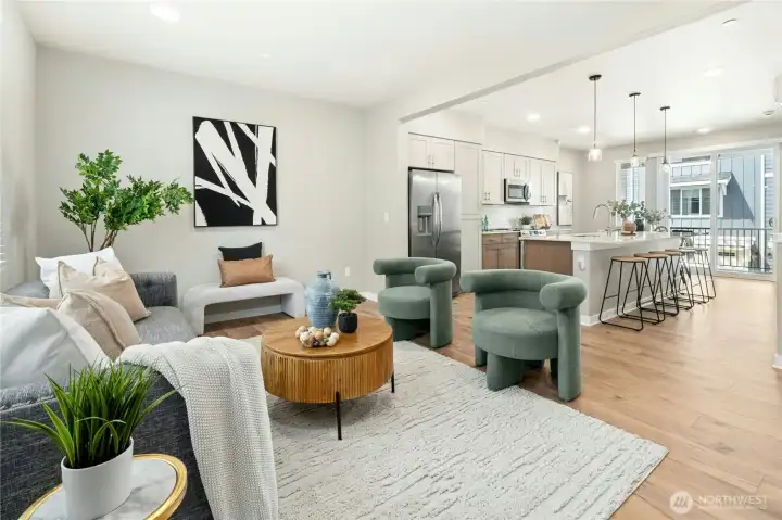 Open-concept design creates seamless flow between kitchen, dining, and living spaces