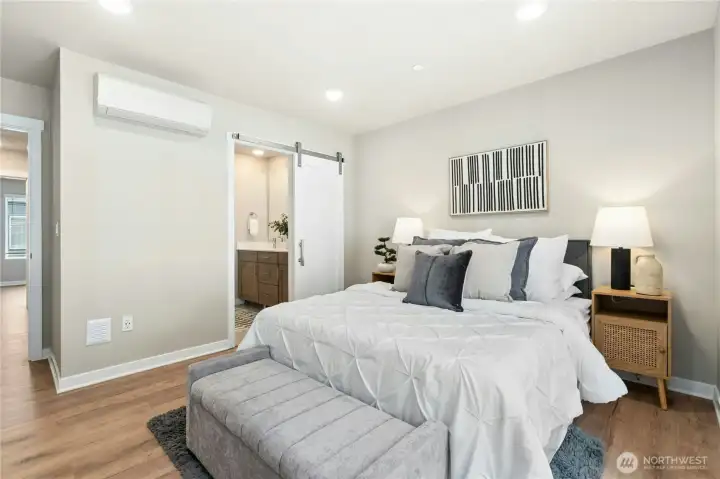 Spacious primary retreat featuring a walk-in closet and spa-inspired ensuite bath.