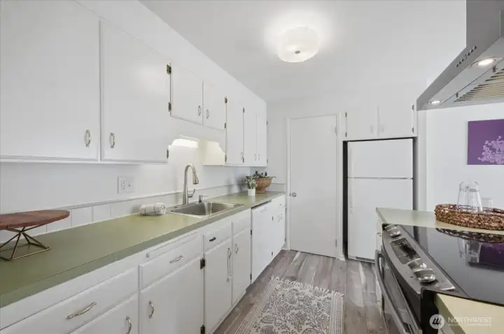 Kitchen with plenty of cabinets and counter space.