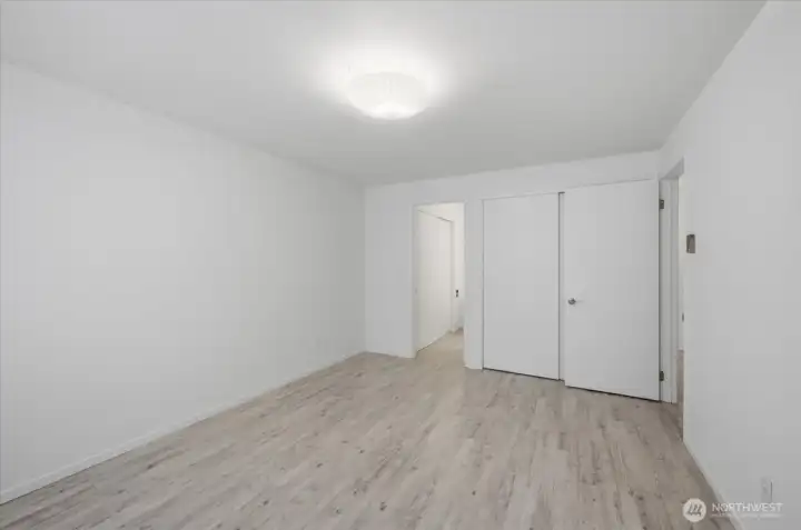 Primary bedroom with additional storage space.