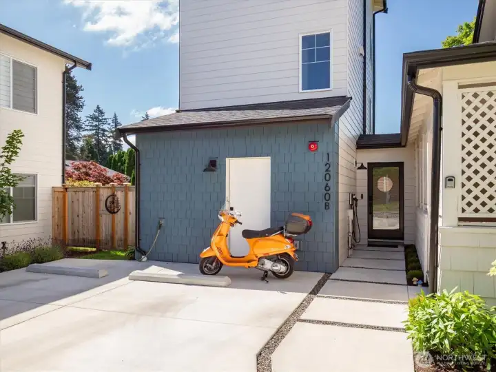 You’ve got the parking spot in front of the scooter for your daily ride, complete with EV charging! You’ve got the parking spot in front of the scooter for your daily ride, complete with EV charging!