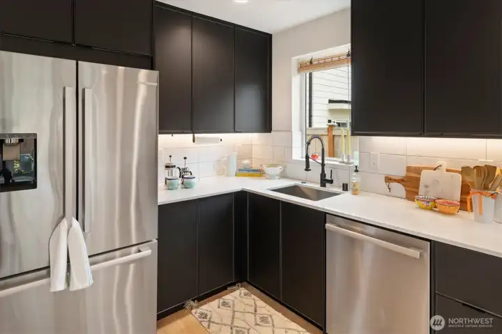 The tile backsplash, solid countertops and the stainless appliance package are all ideal. The tile backsplash, solid countertops and the stainless appliance package are all ideal.
