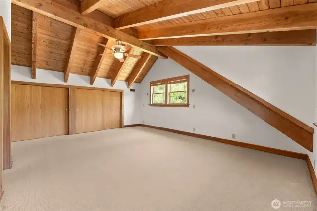 Spacious primary w/ beautiful wood work.