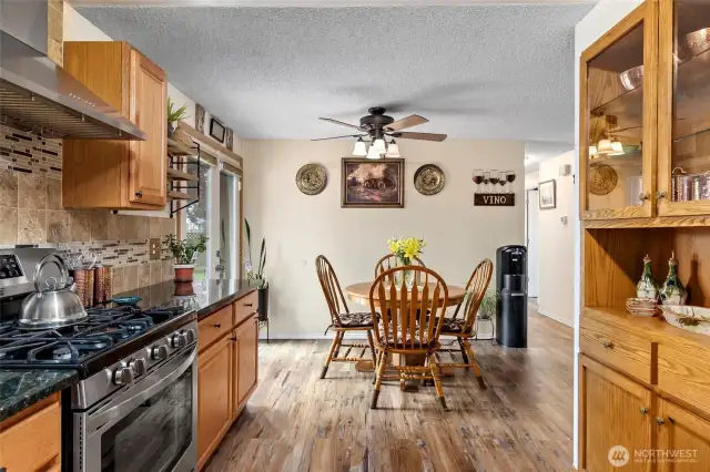 Kitchen is open to dining room.