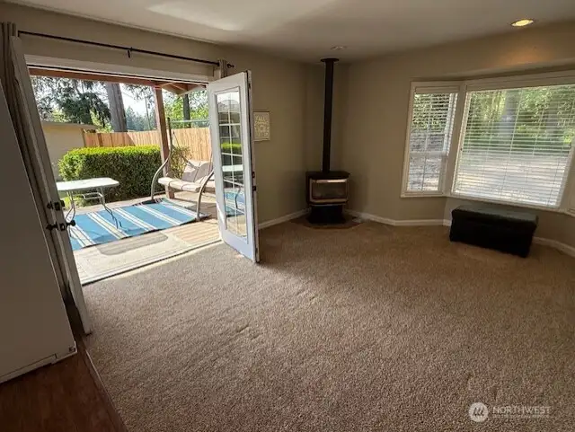 Another living area with propane stove ~ could be rec room, office, multi generational living....