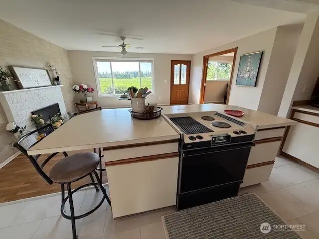 You will love the large kitchen island with downdraft stove and oven- seats 6