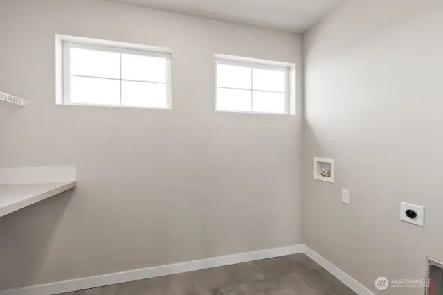 Conveniently located utility room on the upper floor; Colors, finishes, and options will vary.