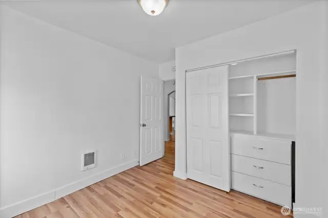 Second view of Primary showing built-in dresser in closet.