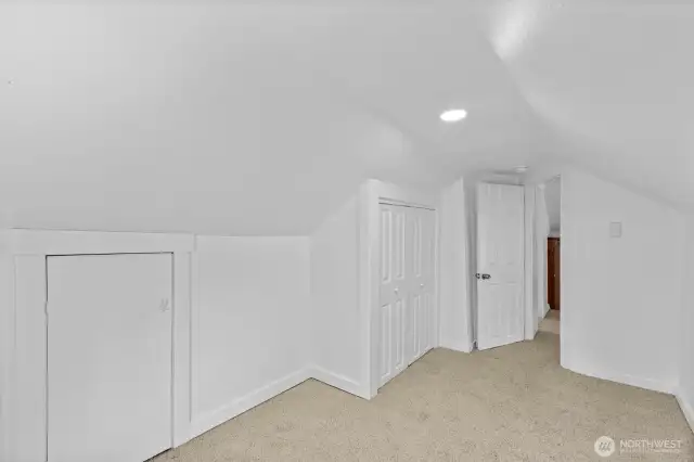 Closet plus knee wall storage access.