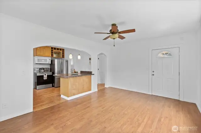 Kitchen open to front room with eating bar.