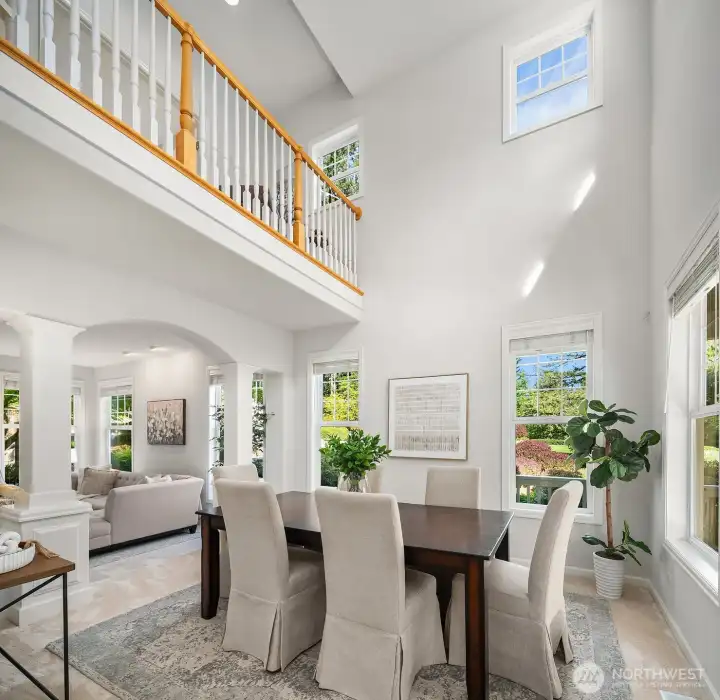 Gorgeous dining room with vaulted ceiling.