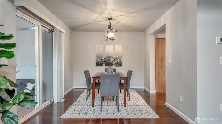 Dining Room. Sunroom To The Left Of The Dining Room Table