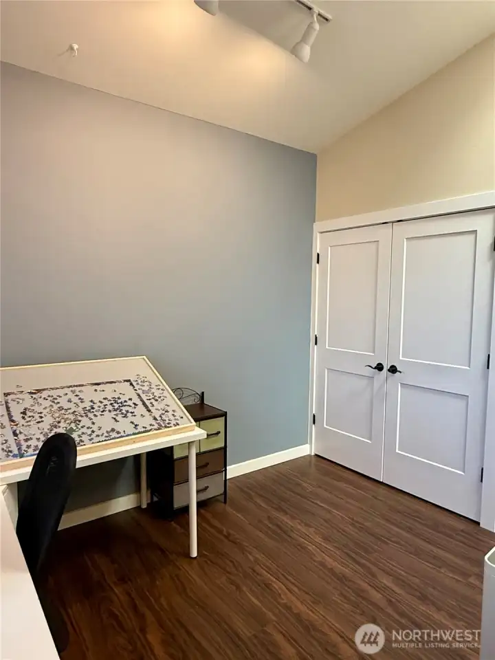 The area off of the kitchen makes for an excellent office space or additional dining area.