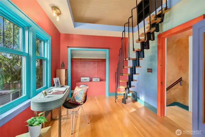 The space-saving DOLLE GRAZ modular staircase leads to a magical loft which maximizes the vertical space, adding to the whimsical, multi-level charm of the living areas.