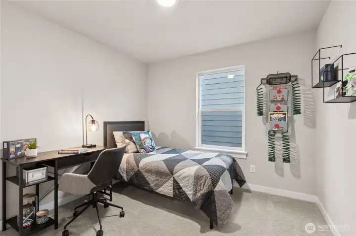 One of the secondary bedrooms. Materials, colors, and finishes will vary. See site agent for details