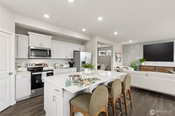 Open concept living with kitchen and large great room keeping the household all together. Photo is representational. Actual home is under construction. Colors, materials, and features may vary. See site agent for details.