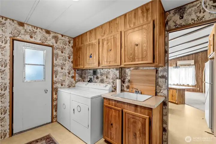 utility room looking into kitchen