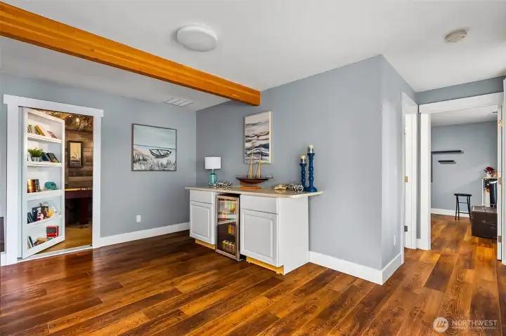 Downstairs w/ Hidden Bookcase to Entertainment Room