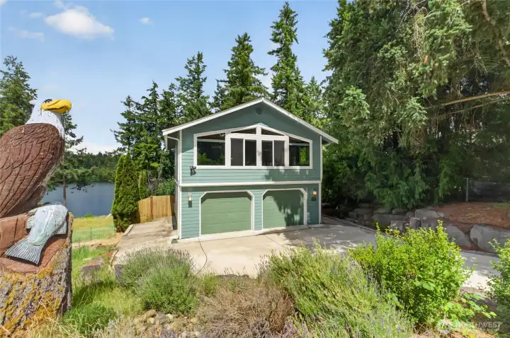 The low maintenance landscape allows you time for relaxing & fun. The side of the home offers added parking or storage space The low maintenance landscape allows you time for relaxing & fun. The side of the home offers added parking or storage space