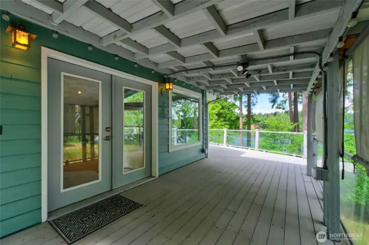 Enjoy time outdoors rain or shine on the covered porch Enjoy time outdoors rain or shine on the covered porch