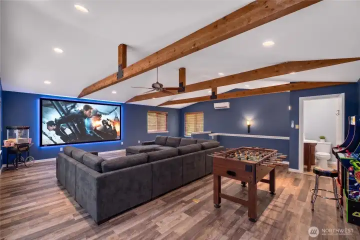 The loft bonus room is huge and offers gorgeous LVT flooring and wood accent beams. Host movie or game nights in a space that can be your ultimate entertainment zone. The convenient 1/2 bath also allows for the space to be an added bedroom for hosting guests. *Room is virtually staged The loft bonus room is huge and offers gorgeous LVT flooring and wood accent beams. Host movie or game nights in a space that can be your ultimate entertainment zone. The convenient 1/2 bath also allows for the space to be an added bedroom for hosting guests. *Room is virtually staged