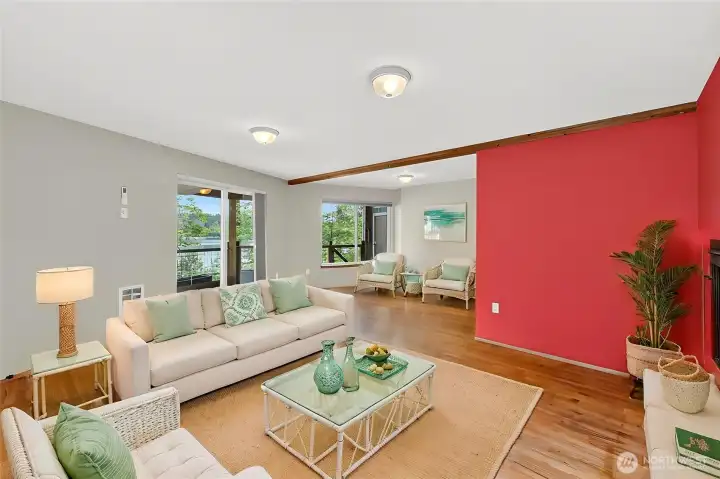 The lower level offers living & bedroom space and a full bath, offering versatility & value for multi-generational living or guest accommodations. Exterior access to the deck and lake views make it an even more inviting & functional space. *Photo virtually staged The lower level offers living & bedroom space and a full bath, offering versatility & value for multi-generational living or guest accommodations. Exterior access to the deck and lake views make it an even more inviting & functional space. *Photo virtually staged