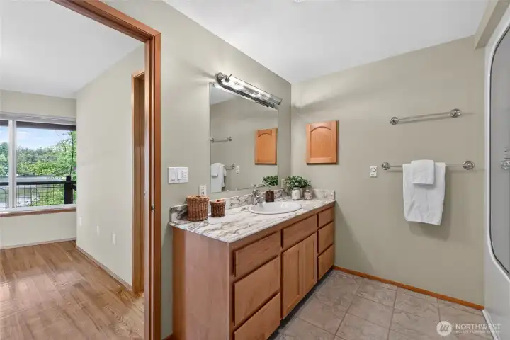 The full bath offers tile floors and a spacious vanity. The full bath offers tile floors and a spacious vanity.
