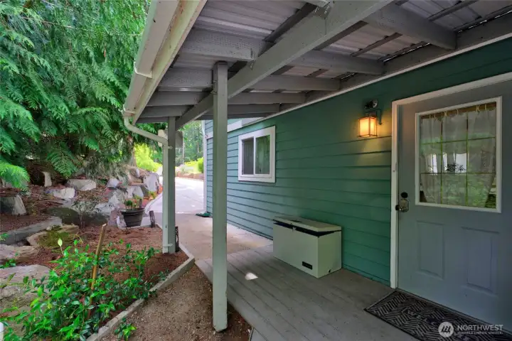 The garage side door entry is covered and there is a secured delivery box. The oversized garage is finished with added lights, heating, storage plus a workshop area. There is also a wired-in generator to keep you comfortable if there is a power outage The garage side door entry is covered and there is a secured delivery box. The oversized garage is finished with added lights, heating, storage plus a workshop area. There is also a wired-in generator to keep you comfortable if there is a power outage