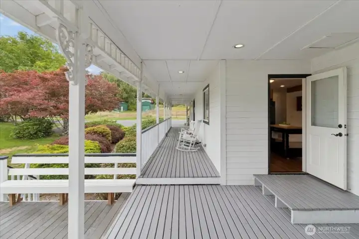 Door off kitchen leading to expansive covered porch.